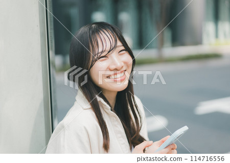 Young woman waiting for appointment 114716556