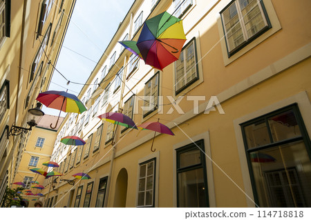 A street in Vienna with suspended umbrellas A street in Vienna with suspended umbrellas 114718818