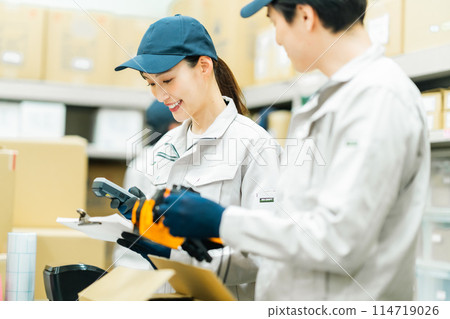 Temporary staff doing light work in the backyard 114719026