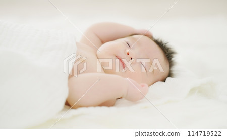 Baby sleeping in bed Baby sleeping in bed 114719522
