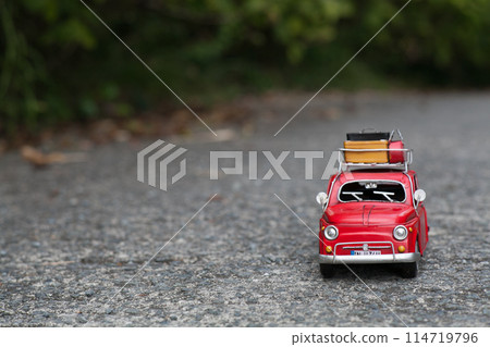 Red tin miniature car 114719796