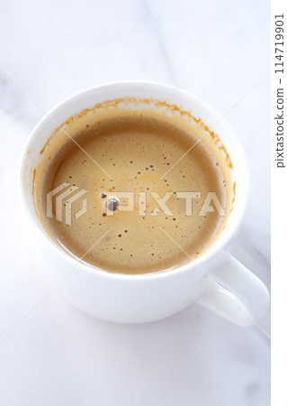 Caffe latte is a mix of espresso and milk 114719901