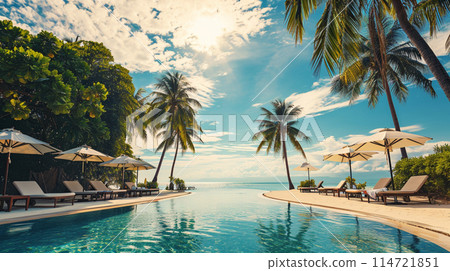 Relaxing tourist scene. Luxurious beach with swimming pool and beach chairs and loungers 114721851
