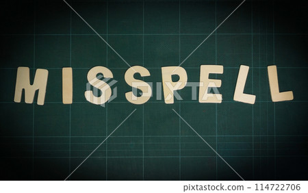 misspell word on green cutting board 114722706
