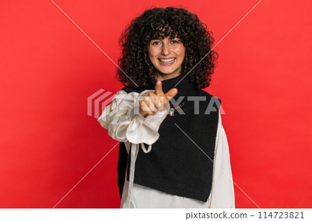 Smiling happy woman pointing forward to camera, choosing lucky victory winner, indicating, promotion Smiling happy woman pointing forward to camera, choosing lucky victory winner, indicating, promotion 114723821
