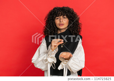 Woman show a little bit gesture begging help need some more please give me measuring small size 114723825