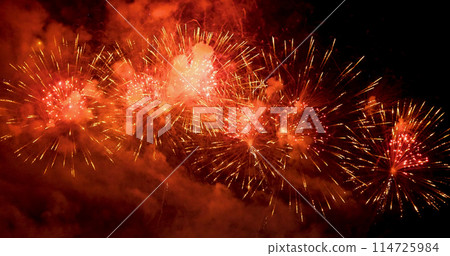 Red Firework celebrate anniversary in night time celebrate national holiday. Happy new year 2024, 4th of july holiday festival. Red firework Countdown to new year 2024 festival party time event 114725984