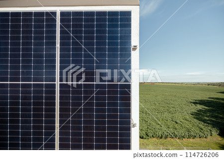 Rooftop of a privat house with a solar power station Rooftop of a privat house with a solar power station 114726206