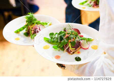 Carrying a salad 114727829