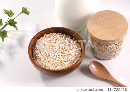 Oatmeal served in a wooden bowl Oatmeal served in a wooden bowl 114729418