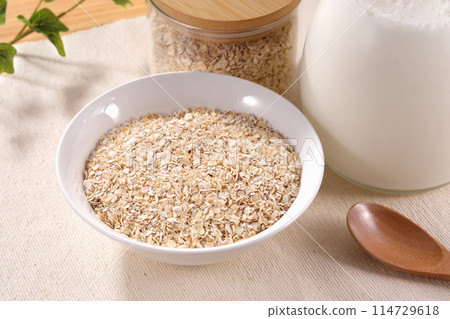 Oatmeal served on a white plate 114729618