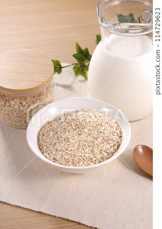 Oatmeal served on a white plate Oatmeal served on a white plate 114729623