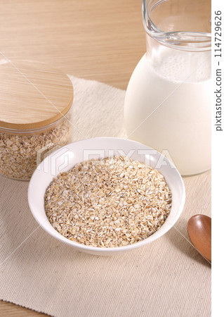 Oatmeal served on a white plate 114729626