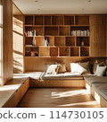 Experience tranquility in this cozy nook with warm wooden bookshelves 114730105