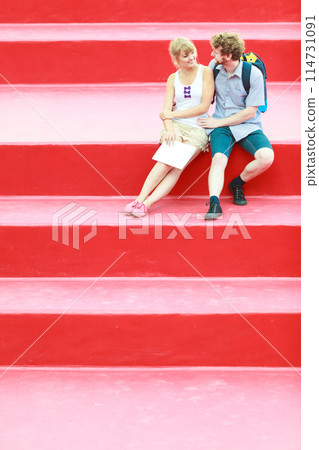 Tourist couple in love traveling together dating Tourist couple in love traveling together dating 114731091