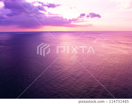 Aerial view sunset sky, Beautiful Light Sunset or sunrise over sea,Colorful dramatic majestic scenery sunset Sky, Amazing clouds and small waves in the ocean, Wonderful light cloud background Aerial view sunset sky, Beautiful Light Sunset or sunrise over sea,Colorful dramatic majestic scenery sunset Sky, Amazing clouds and small waves in the ocean, Wonderful light cloud background 114731485