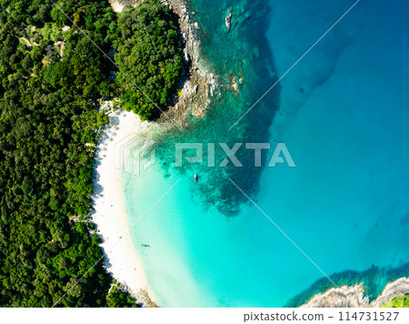 Aerial view Top down seashore background,Waves crashing on rock cliff, Beautiful dark sea surface in sunny day summer background, Amazing seascape top view seacoast at Phuket beach Thailand 114731527