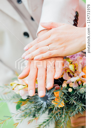 A shining ring on your ring finger A shining ring on your ring finger 114731976