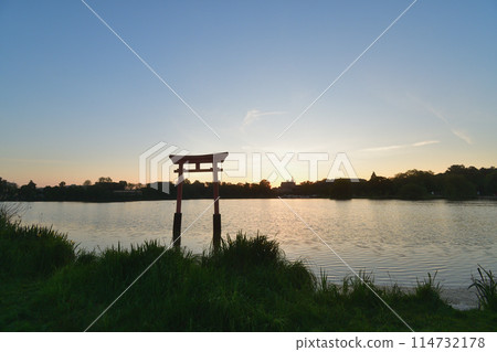 Metz, France. A torii gate and the cathedral in the distance at sunrise. Photo taken on May 10, 2024. Metz, France. A torii gate and the cathedral in the distance at sunrise. Photo taken on May 10, 2024. 114732178