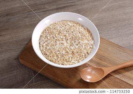 Oatmeal served on a white plate 114733250