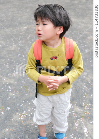 A boy who is crying 114733830