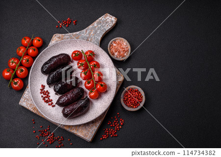 Delicious black blood sausage or black pudding with spices and herbs Delicious black blood sausage or black pudding with spices and herbs 114734382