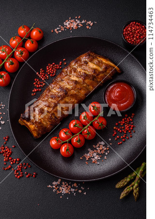 Delicious juicy grilled ribs with honey and mustard sauce 114734463