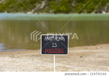 Anything is possible symbol. Concept words Anything is possible on beautiful black chalk blackboard. Beautiful mountain lake background. Business anything possible concept. Copy space. Anything is possible symbol. Concept words Anything is possible on beautiful black chalk blackboard. Beautiful mountain lake background. Business anything possible concept. Copy space. 114735143