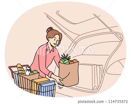 Smiling woman unload groceries into car Smiling woman unload groceries into car 114735872