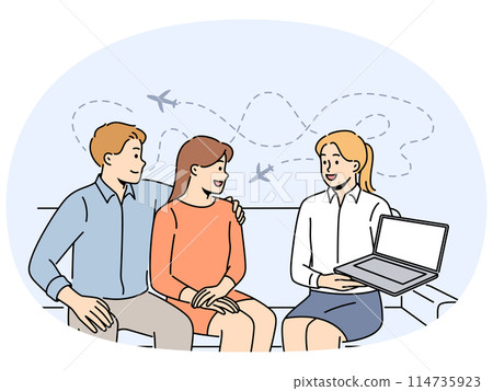 Tour operator showing offer on laptop to clients 114735923