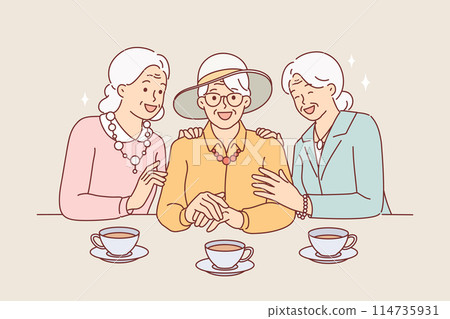 Elderly women drink tea and laugh, rejoicing at long-awaited meeting, dressed in elegant clothes 114735931