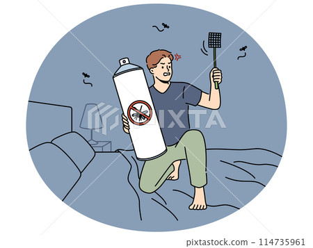 Angry man with flyswatter aerosol from mosquitos at home 114735961