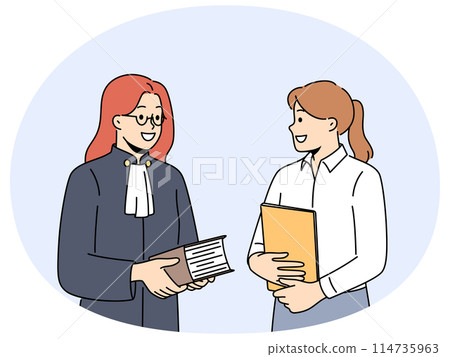 Female lawyer and paralegal in office 114735963