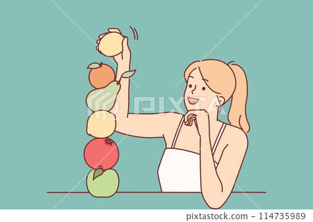 Woman builds fruit pyramid using organic food bought at farmers market to detox body Woman builds fruit pyramid using organic food bought at farmers market to detox body 114735989
