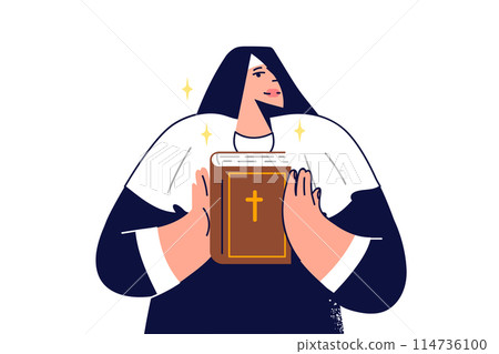 Woman nun holds holy bible in hands and demonstrates main Christian book to parishioners 114736100