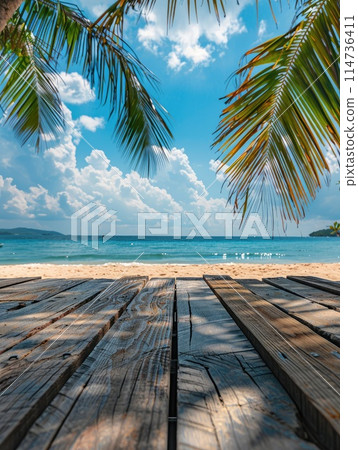 Empty wood table over blue sea, beach and palm leaves background in summer day. Space for product display. 114736411