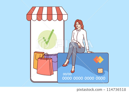 Phone for mobile shopping and woman shopper sitting on credit card to pay for online purchases 114736518