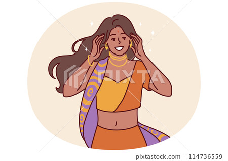 Woman in national Indian sari costume and golden jewelry for traditional dance or wedding ceremony 114736559