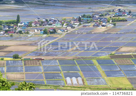 Aizu Basin scenery in early summer and a train on the Tadami Line, aerial view from Futanuma, Aizu Misato Town, Fukushima Prefecture Aizu Basin scenery in early summer and a train on the Tadami Line, aerial view from Futanuma, Aizu Misato Town, Fukushima Prefecture 114736821