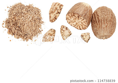 Whole and grated nutmeg isolated on white background. Top view with copy space for your text. Flat lay Whole and grated nutmeg isolated on white background. Top view with copy space for your text. Flat lay 114738839