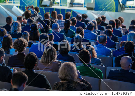 Audience attentively listening at a conference or seminar 114739387