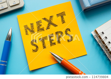 Paper sticker with words next steps as planning concept. Paper sticker with words next steps as planning concept. 114739804