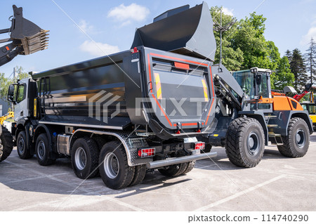 Heavy construction machines during a work 114740290