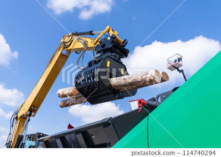 Loading of timber. Loader close up Loading of timber. Loader close up 114740294