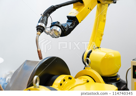 Welding robot arms on a smart factory 114740345