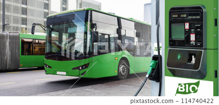 Biofuel filling station on a background of green city bus. Decarbonization of public transport 114740422