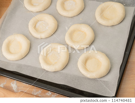 ring of dough with quark in the middle. baking at home, Ball dough with cottage cheese ring of dough with quark in the middle. baking at home, Ball dough with cottage cheese 114740481