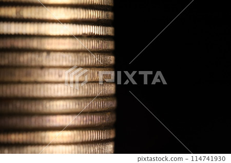 Stack of coins in close-up, texture of old coins Stack of coins in close-up, texture of old coins 114741930