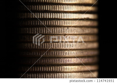 Stack of coins in close-up, texture of old coins Stack of coins in close-up, texture of old coins 114741931