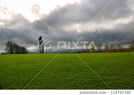 View of Bannockburn Battlefield in Scotland with Statue of Robert the Bruce on a Stormy Afternoon View of Bannockburn Battlefield in Scotland with Statue of Robert the Bruce on a Stormy Afternoon 114742390